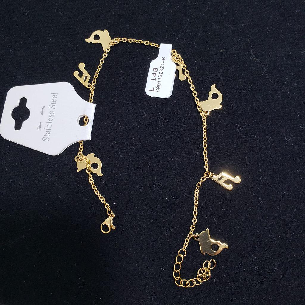 Tobillera gold nota musical con delfin